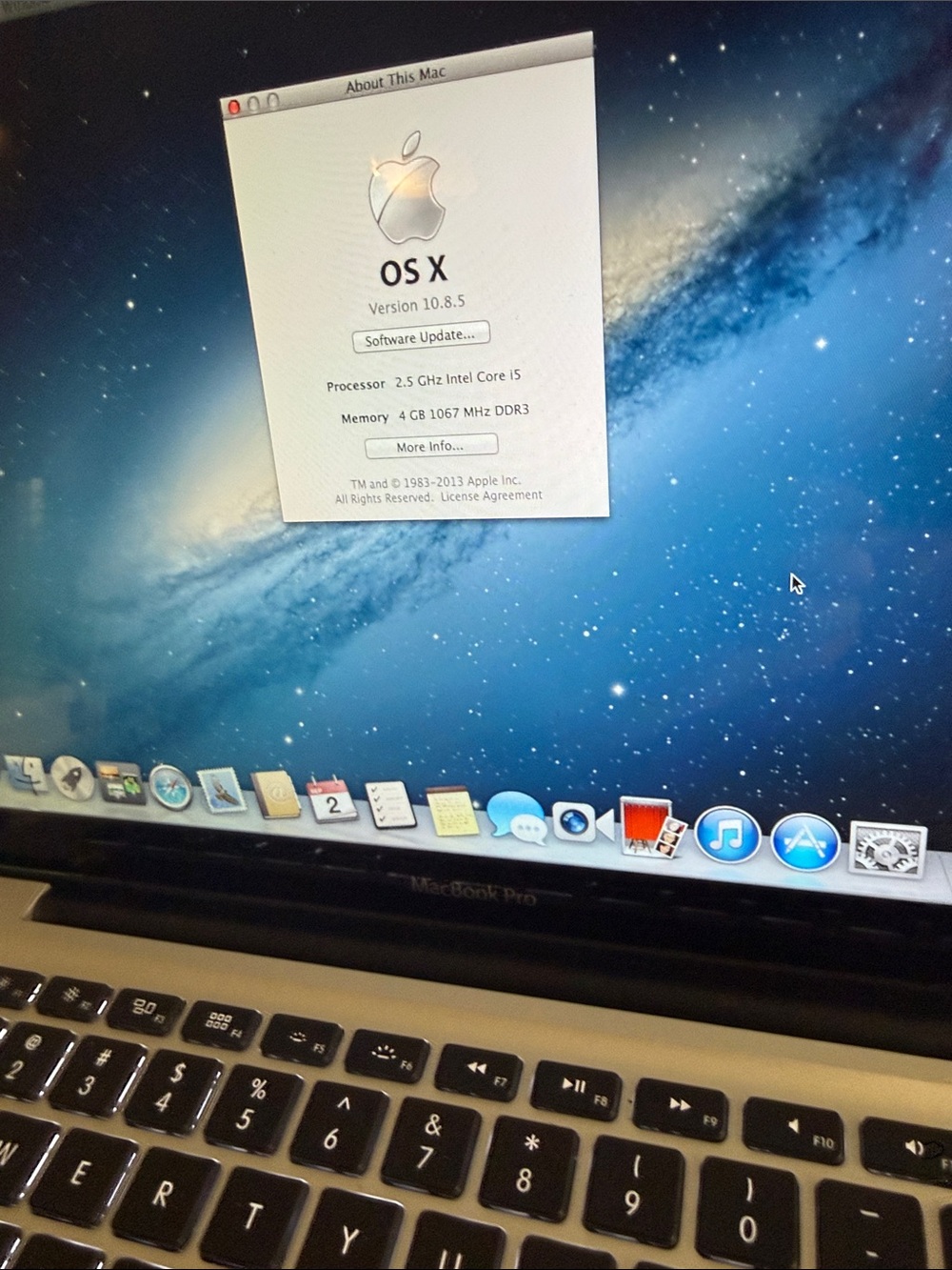 Apple MacBook Pro Silver with Black Keyboard and Blue Display - Picture 2 of 8